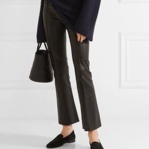 The Row black stretch leather side zip ankle flare